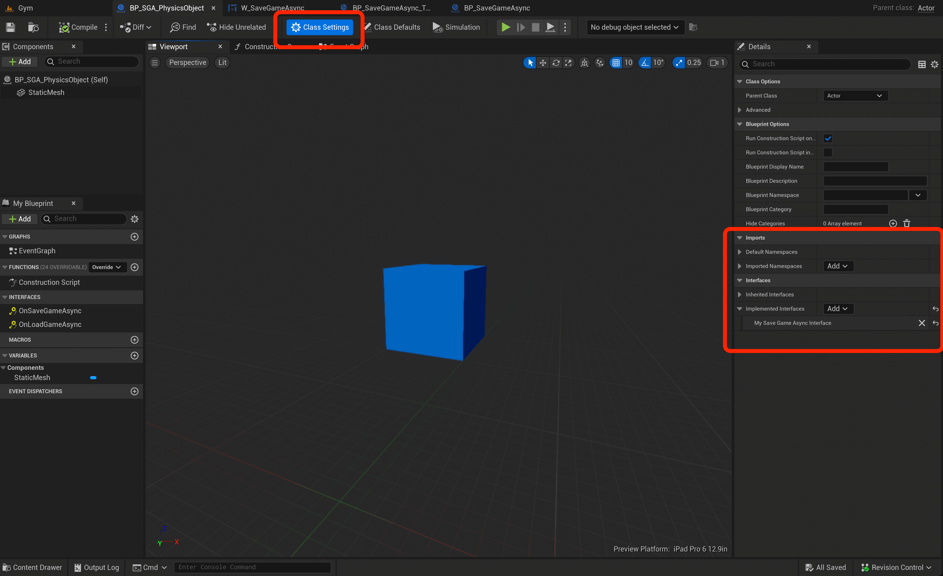 Unreal Engine 5 BP_SGA_PhysicsObject Blueprint Viewport showing the blue cube mesh along with Class Settings and inherited interfaces circled in red